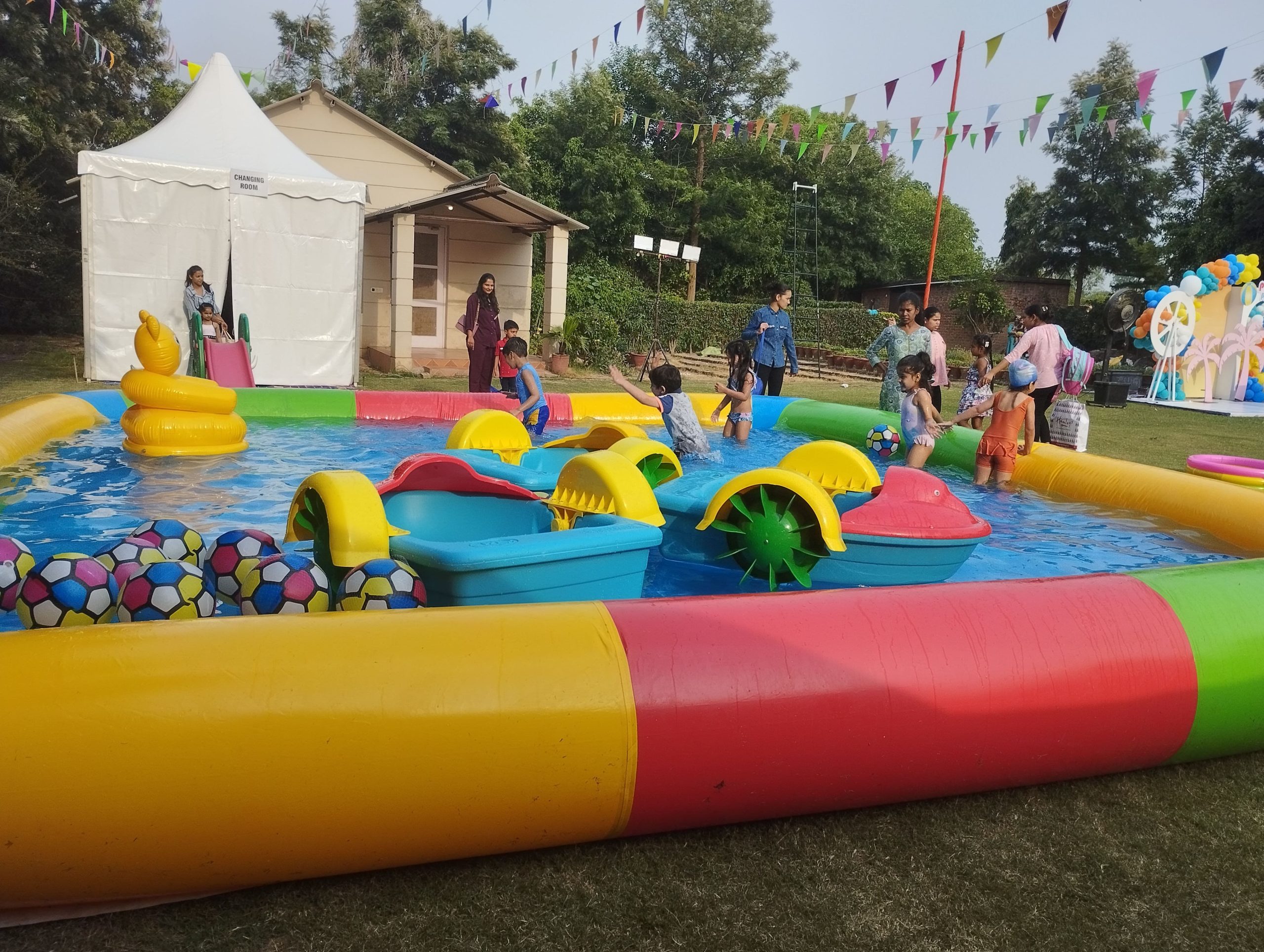 Big Swimming pool with 3 Boats on rental for pool party with Balls and water toy